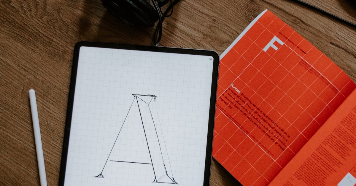 iPadと紙の本でデザイン作業